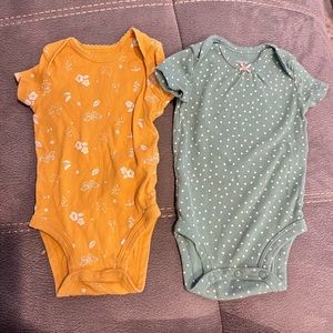 Baby girl Carters yellow and green onesies size 3 months.